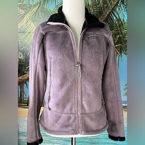 Purplish gray wind block jacket.